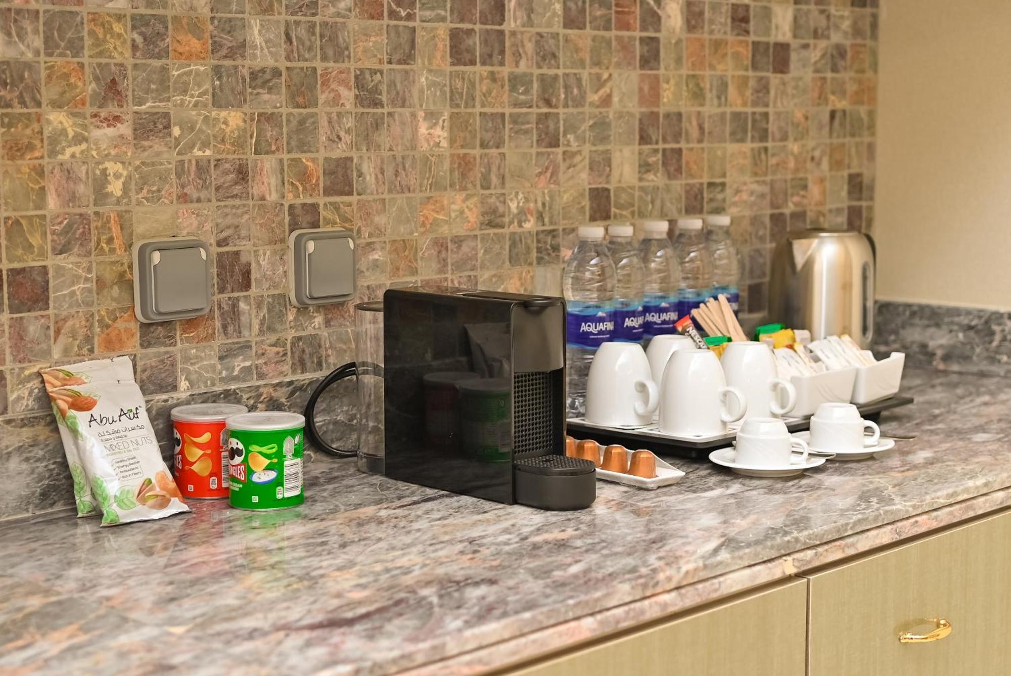Hilton Hurghada Plaza Hotel Esterno foto A Nespresso coffee machine